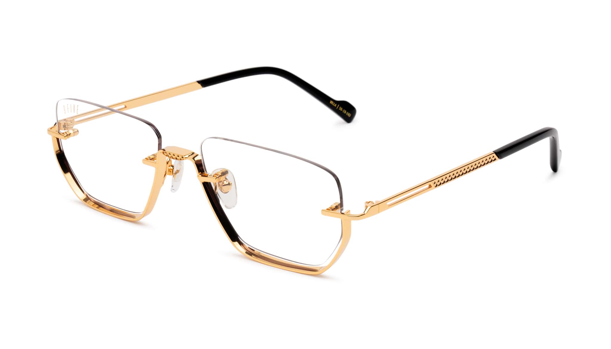 Gold-rimmed eyeglasses on a white background
