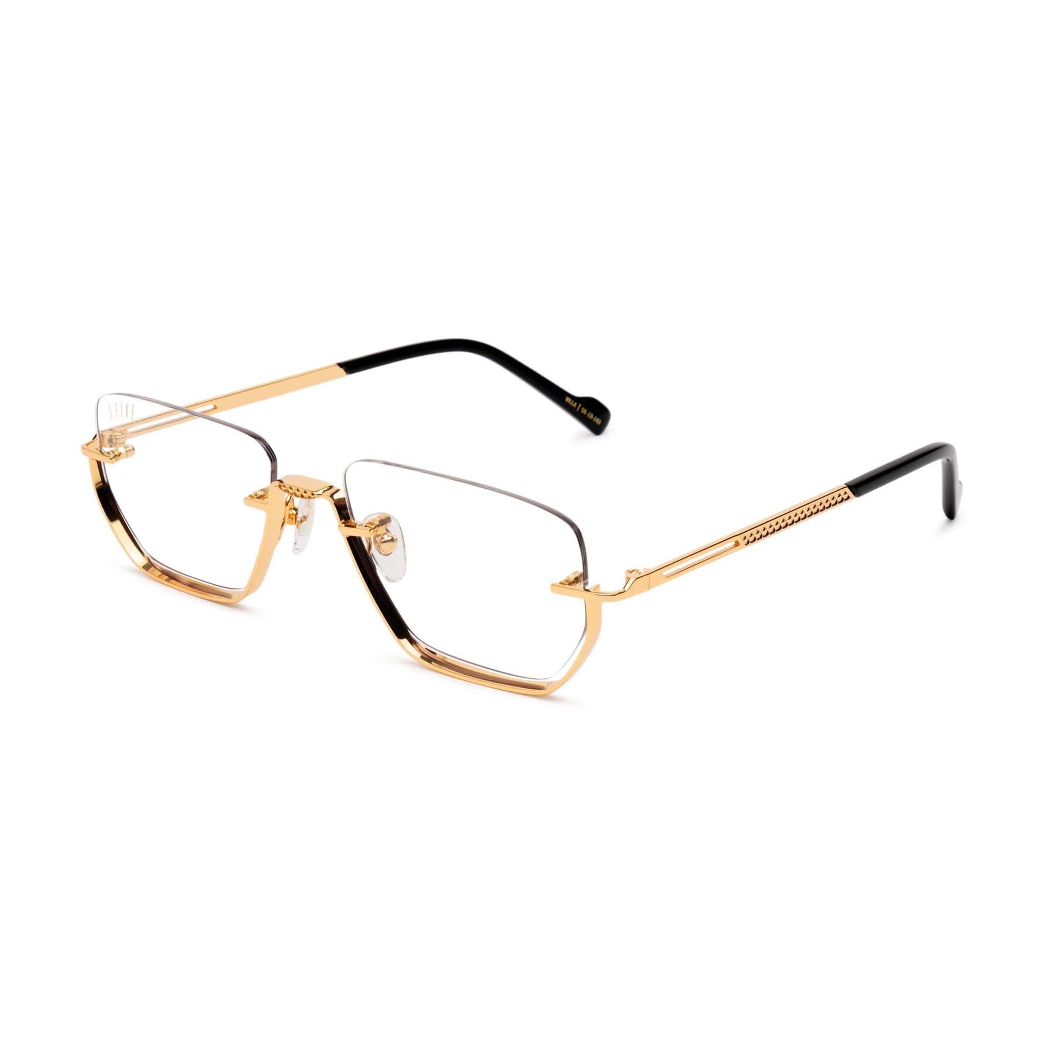 Gold-rimmed eyeglasses on a white background
