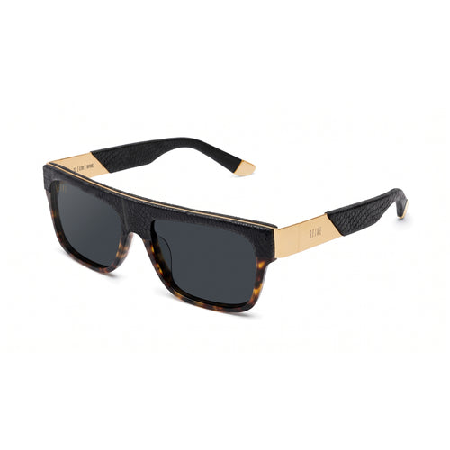 A pair of designer sunglasses with a double-bridge design, featuring a textured black snake leather and tortoiseshell frame with gold metal accents and dark lenses.
