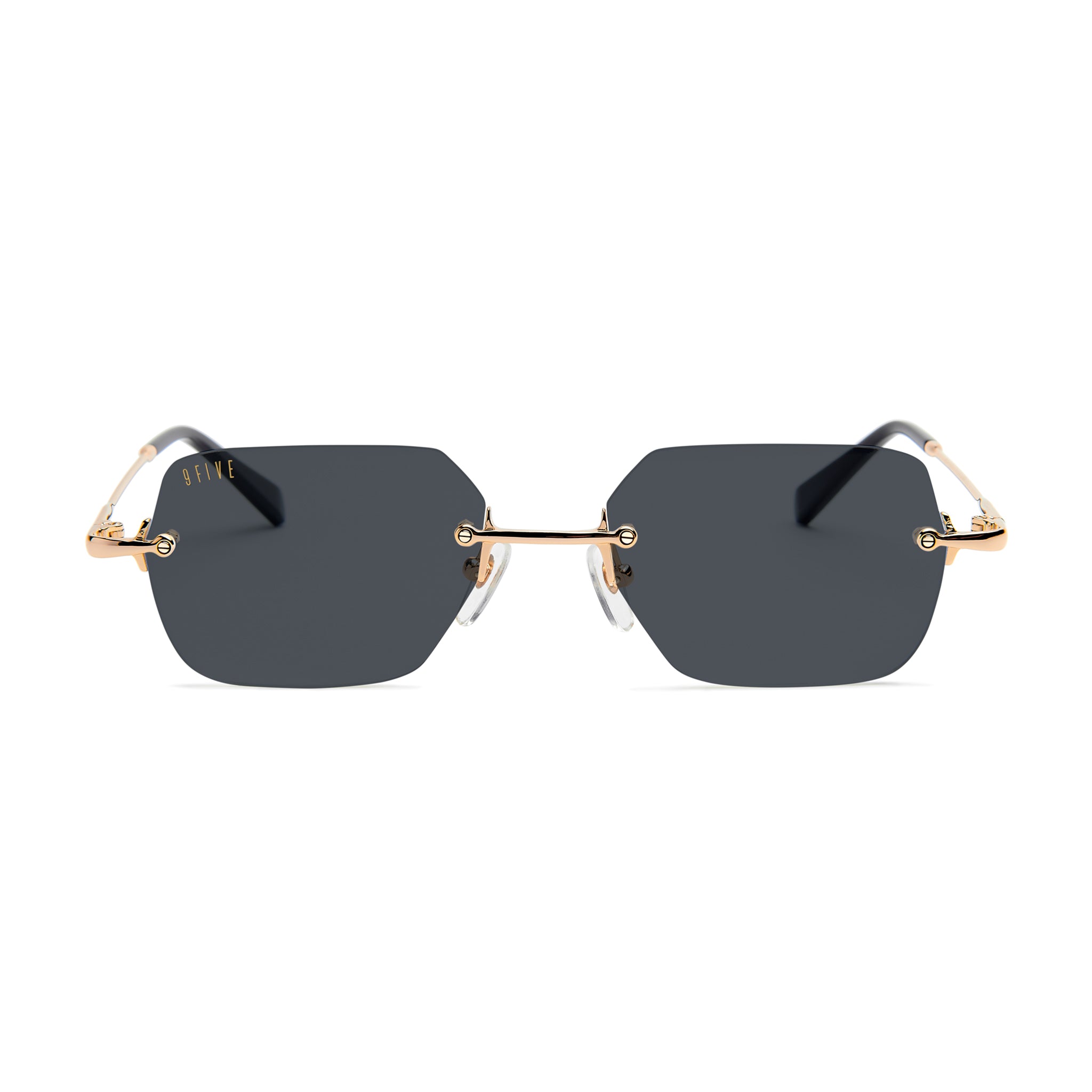 Rimless square sunglasses with dark gray lenses and gold metal frames, shown against a plain white [g:black s:all o:1]background.
