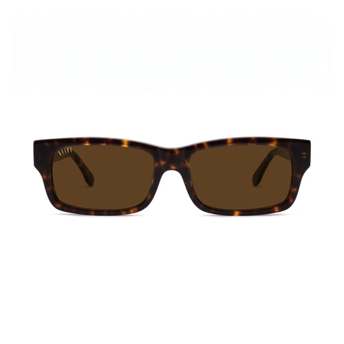 A pair of rectangular sunglasses with a dark brown and amber tortoiseshell frame and brown lenses, shown against a plain white background. [g:brown s:all o:1]