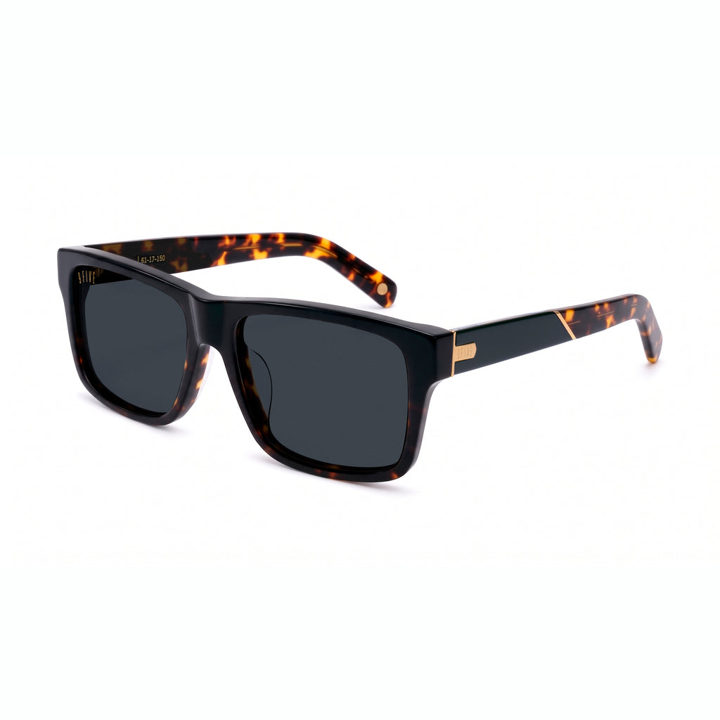 Rectangular sunglasses with black upper frame with tortoise lower frame and black and tortoise temples featuring gold logos [g:black s:all o:2]
