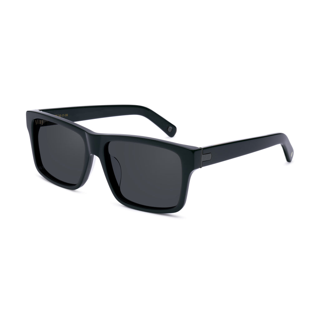 Black rectangular sunglasses with dark lenses and slim temples, shown at a three-quarter angle on a white background. [g:black s:all o:2]
