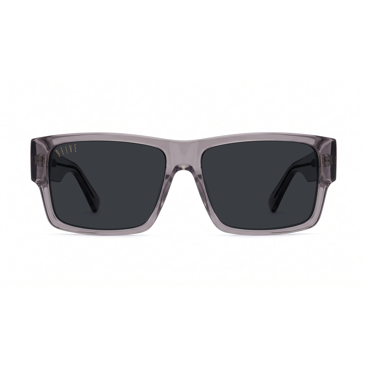 A pair of square sunglasses with a translucent smoky gray acetate frame and dark gray lenses, shown at a three-quarter angle on a plain white background.
[g:black s:all o:1]