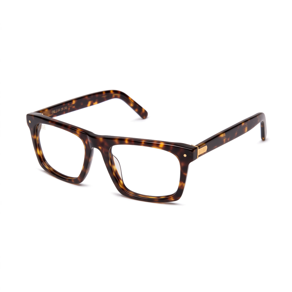 A pair of rectangle eyeglasses with a classic tortoiseshell pattern in dark brown and amber, featuring gold metal rivets on the temples, shown against a plain white background. [g:clear s:all o:2]