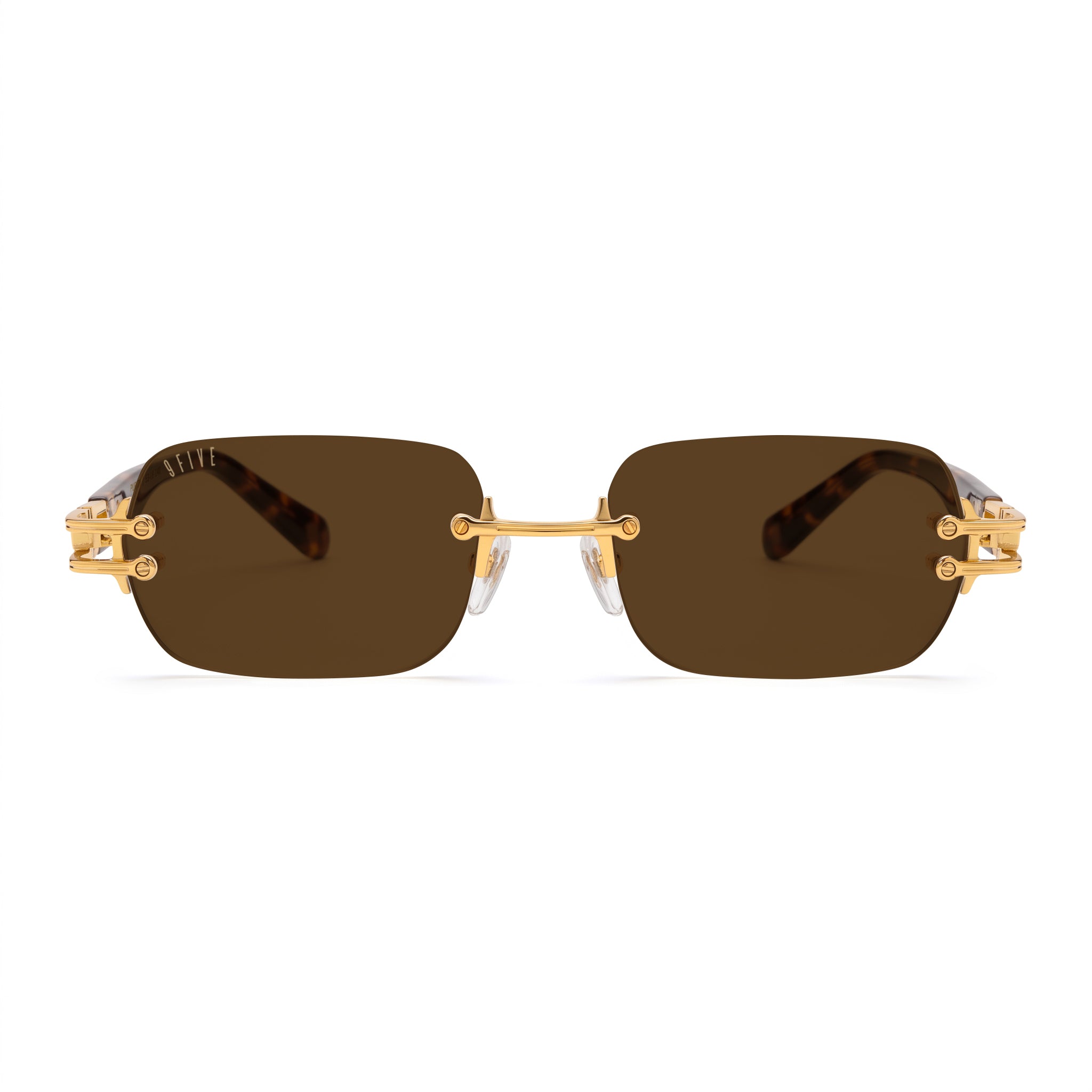 Rimless square sunglasses with dark brown lenses and gold metal hardware, shown from the front on a white background. [g:brown s:all o:1]