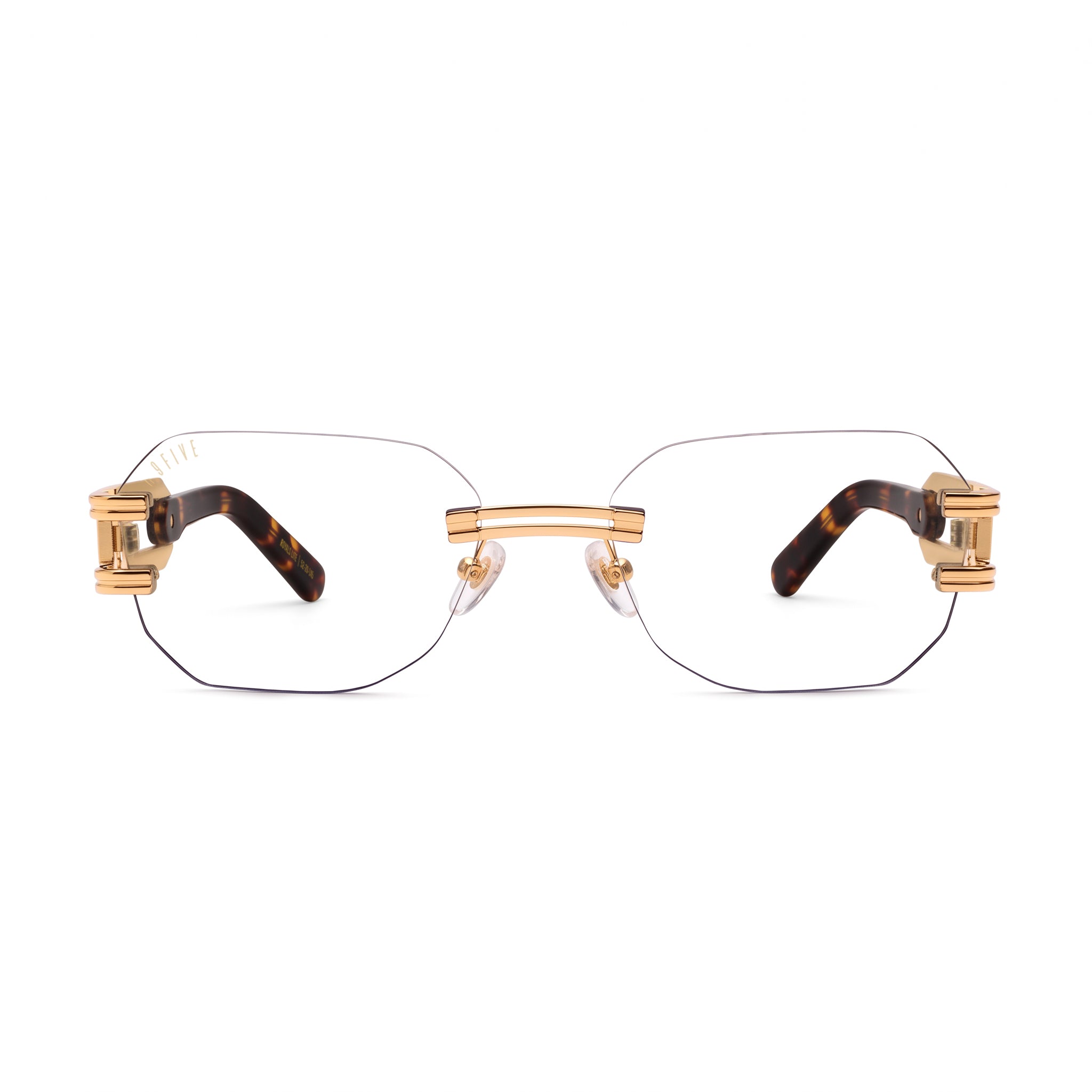 Rectangular rimless eyeglasses with gold metal hardware and tortoiseshell temple arms, shown against a plain white background. [g:clear s:all o:1]