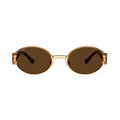 Oval sunglasses with gold metal frames, brown gradient lenses, and tortoiseshell acetate temples, shown on a clean white background. [g:brown s:all o:1]