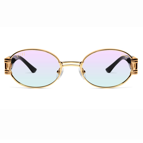 Oval sunglasses with a gold metal frame and gradient lenses shifting from light blue to soft pink, featuring decorative gold side accents and black temple tips.