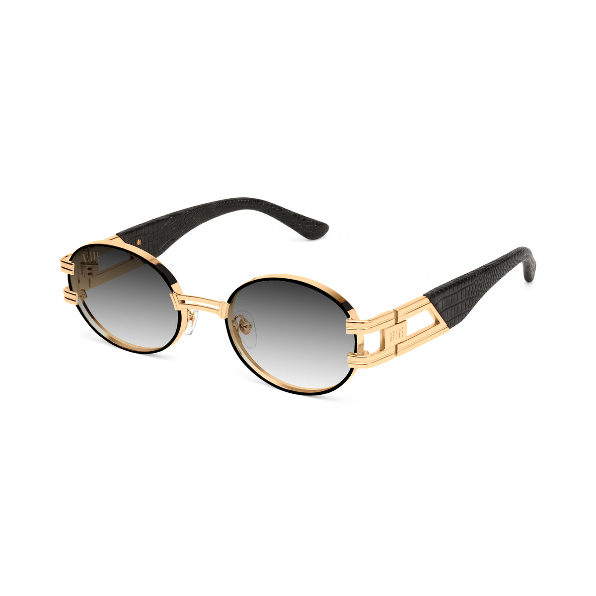 Oval sunglasses with dark lenses, a gold metal frame, and black temple tips, shown against a plain white background.[g:black-gradient s:all o:2]