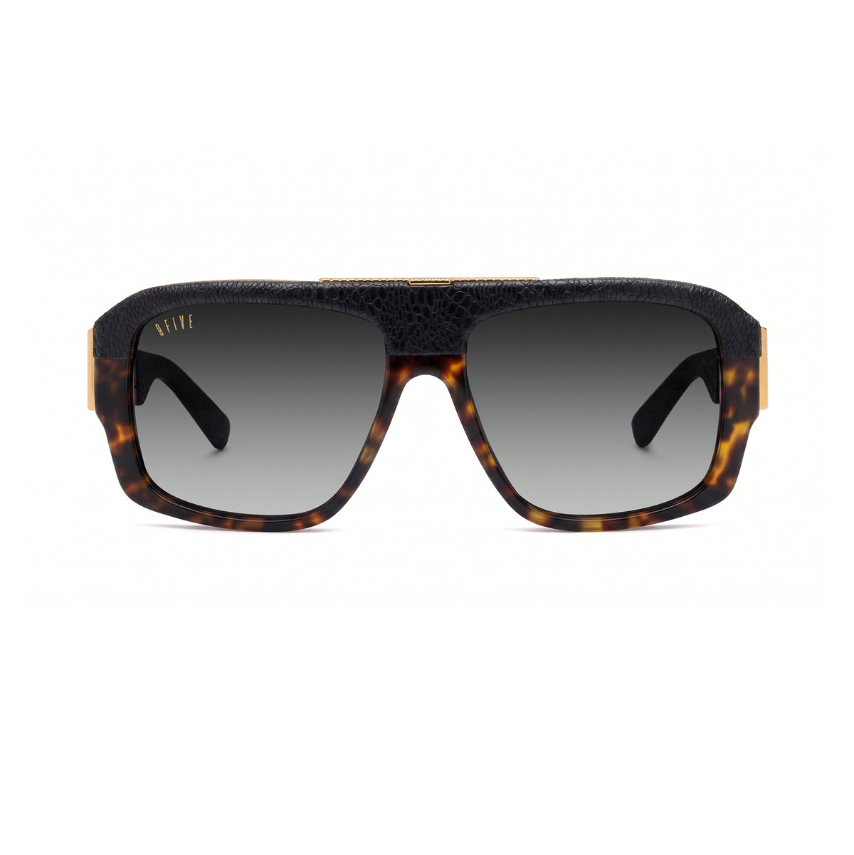A pair of designer sunglasses featuring a black reptilian leather frame, dark brown and black tortoiseshell acetate on the lower rims, gold metal bridge and temple accents, and dark lenses. [g:black-gradient s:all o:1]
