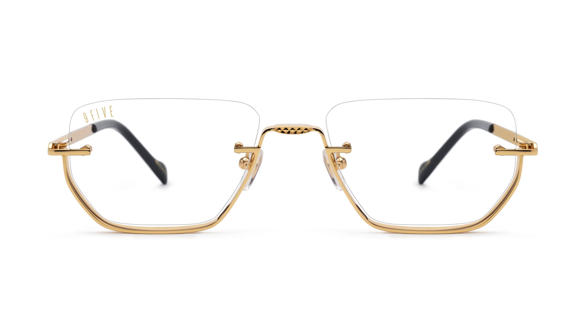 Gold-framed eyeglasses on a white background
