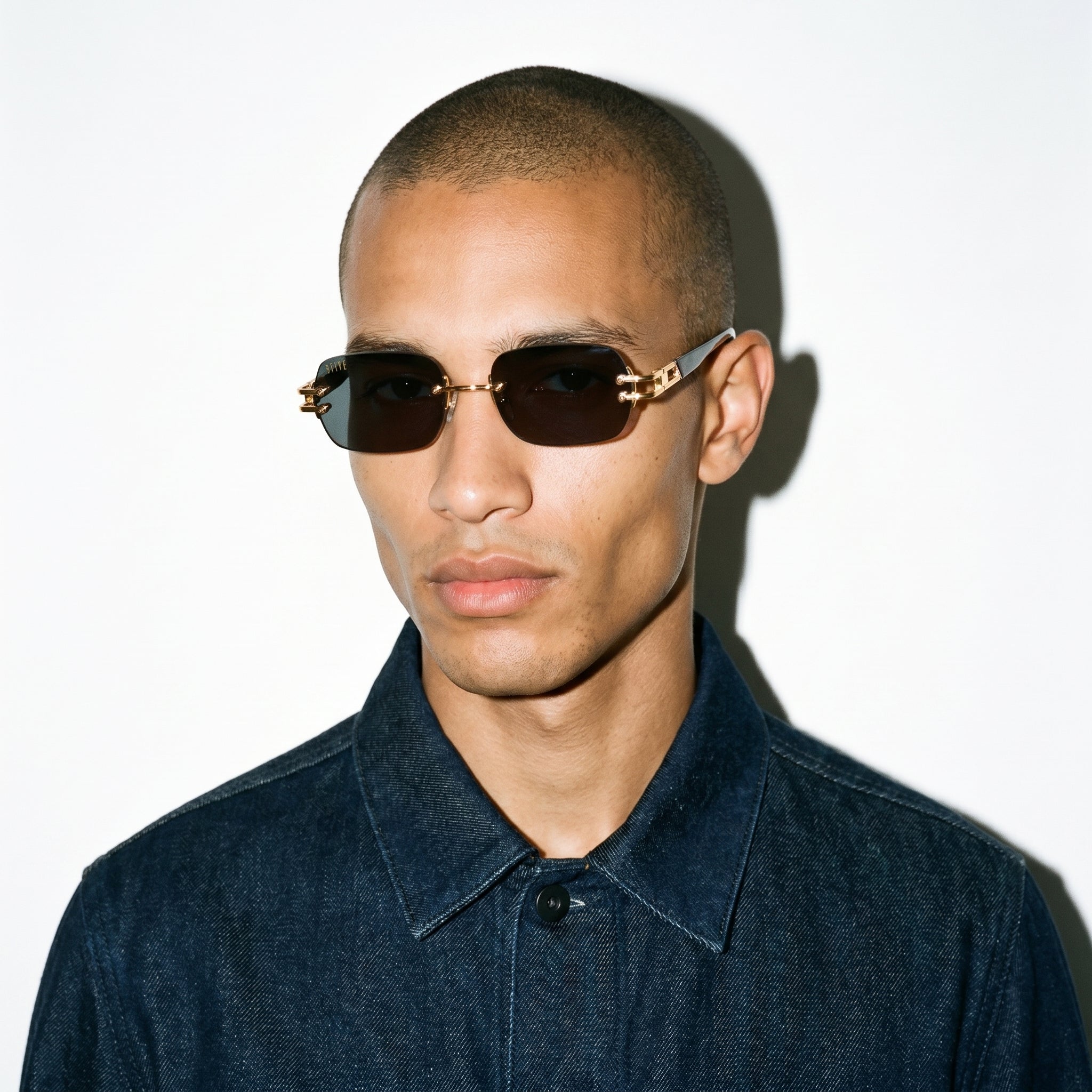 9FIVE Purity Black Sunglasses — worn on model [g:black s:all o:3]