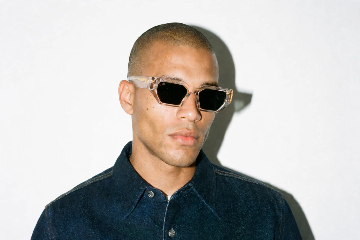 Vincent Crystal Black 24K Gold sunglasses worn on model [g:black s:all o:3]